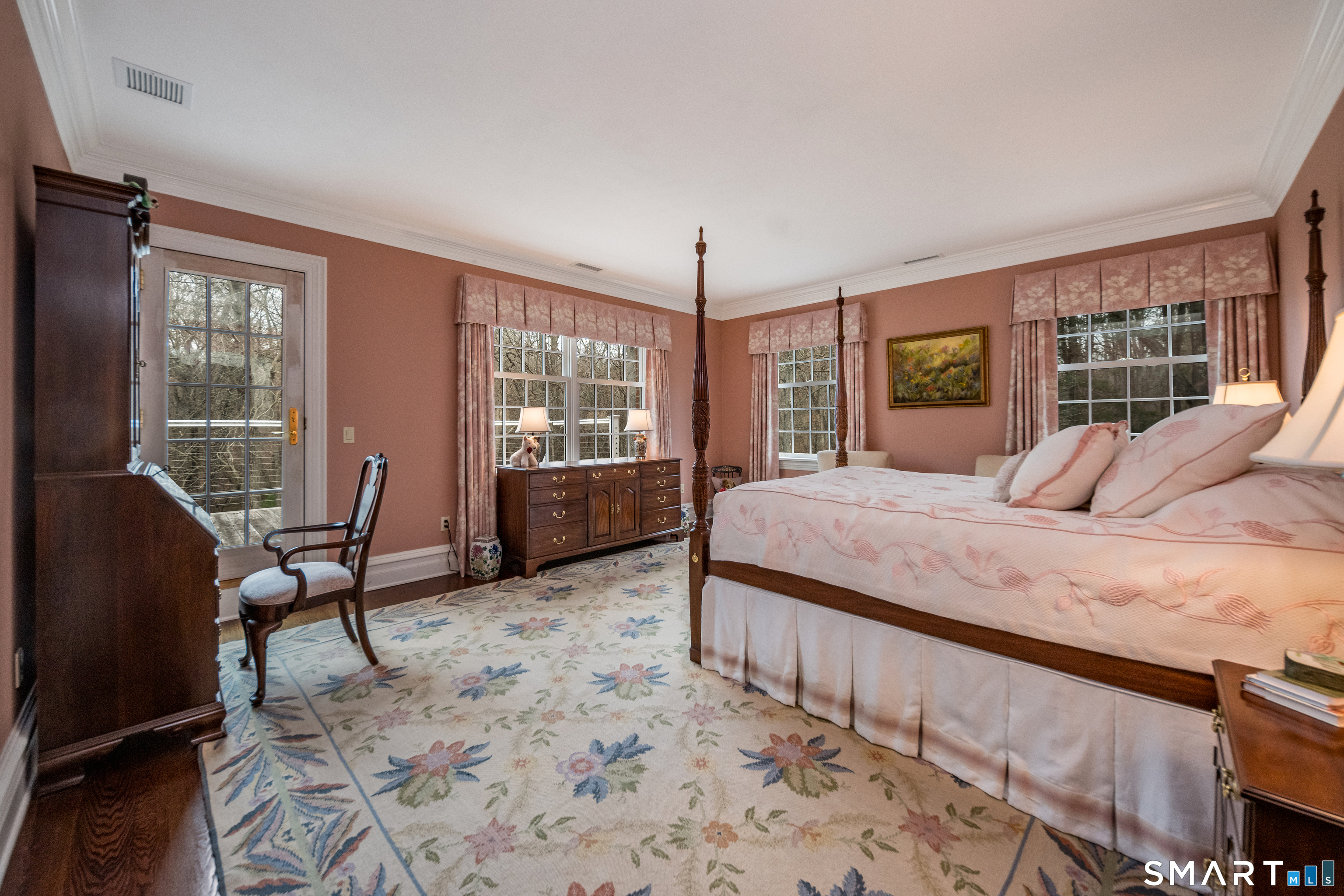 24 Indigo Trail Madison, CT 06443 - Photo 23 of 40 a bedroom with a bed chair and window