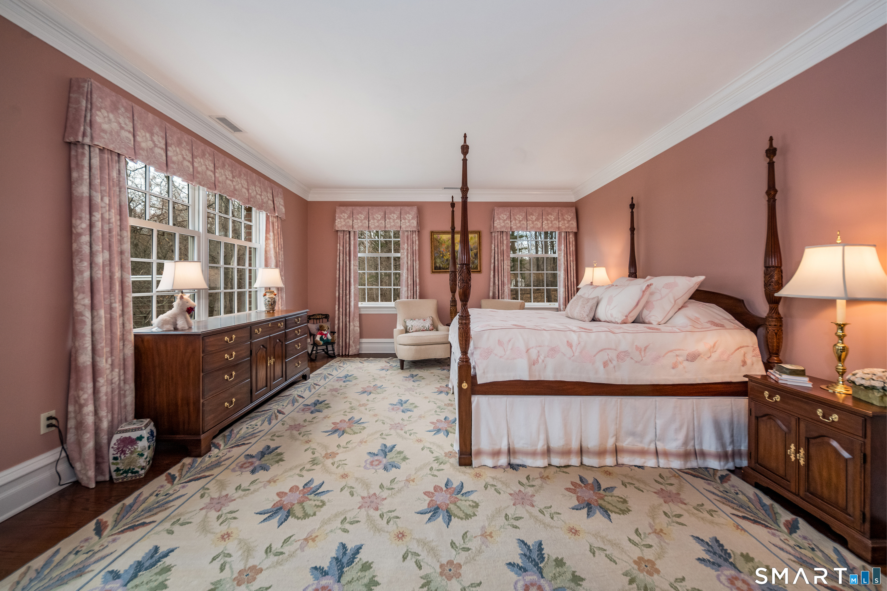 24 Indigo Trail Madison, CT 06443 - Photo 24 of 40 a bedroom with a large bed and a window