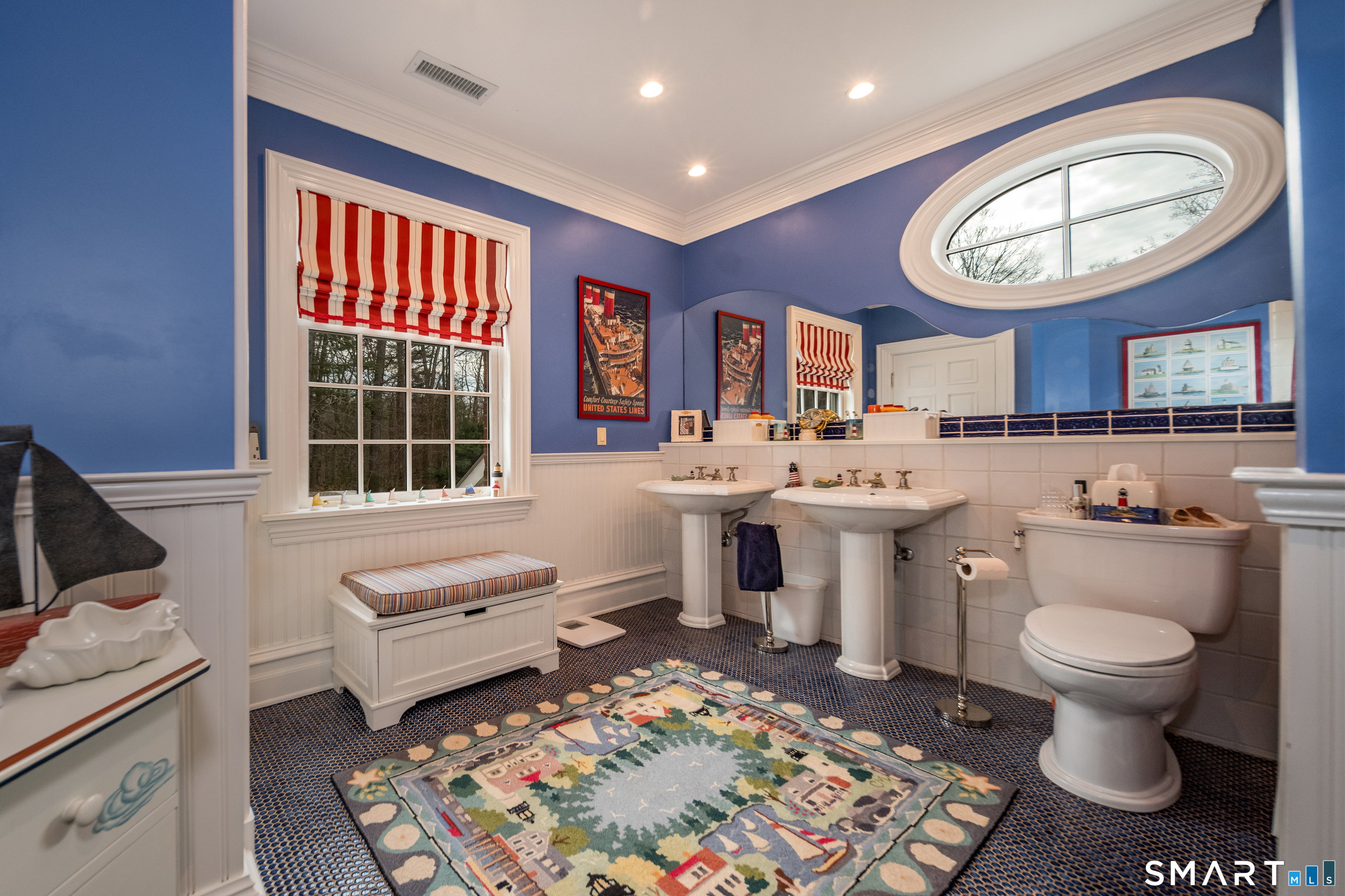 24 Indigo Trail Madison, CT 06443 - Photo 31 of 40 a spacious bathroom with a toilet sink and mirror