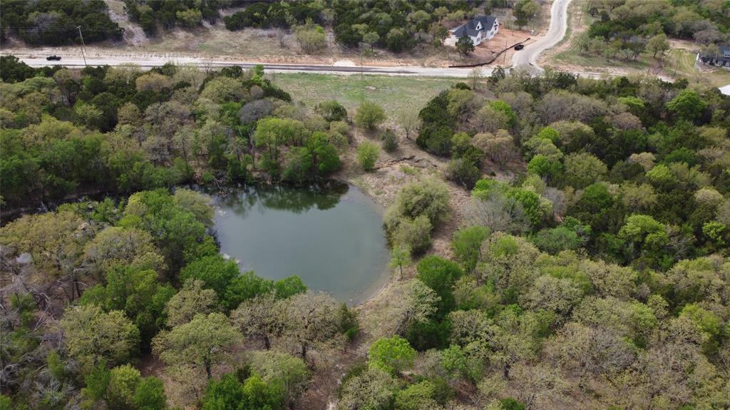 1039 Creek Crossing Road Nemo, TX 76070 - Photo 13 of 27 an aerial view of residential houses with outdoor space and trees
