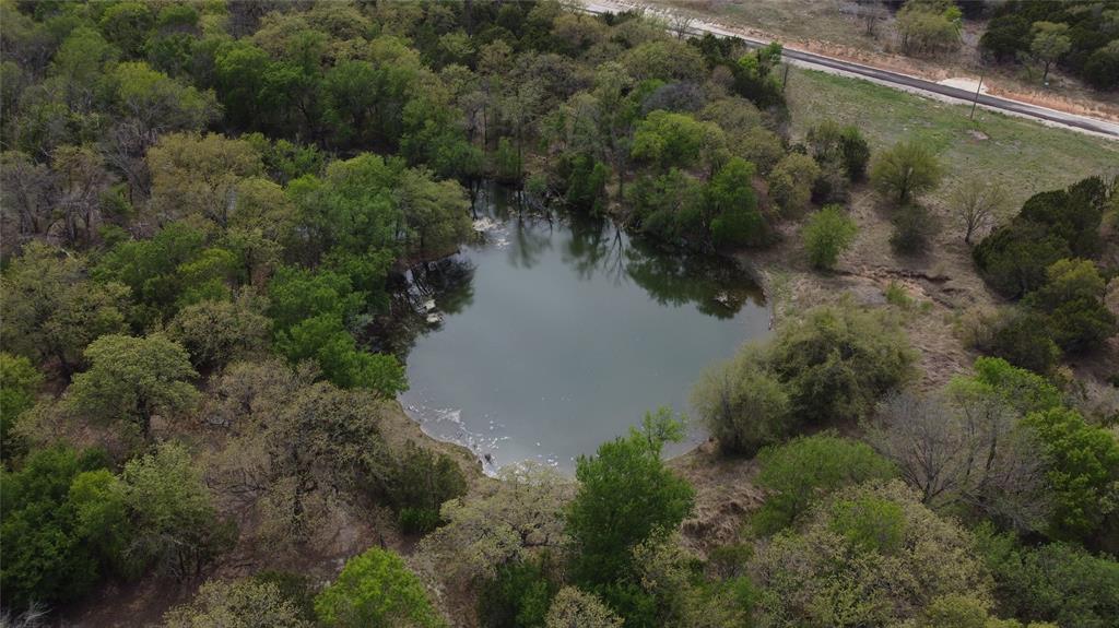 1039 Creek Crossing Road Nemo, TX 76070 - Photo 14 of 27 an aerial view of residential house with outdoor space and trees all around