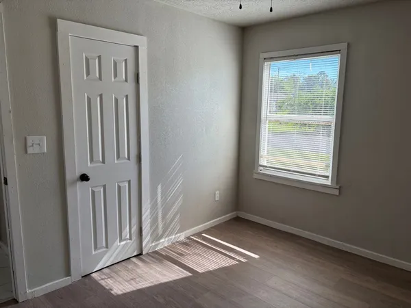 an empty room with windows