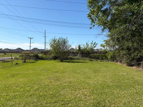 a view of a field with an outdoor space
