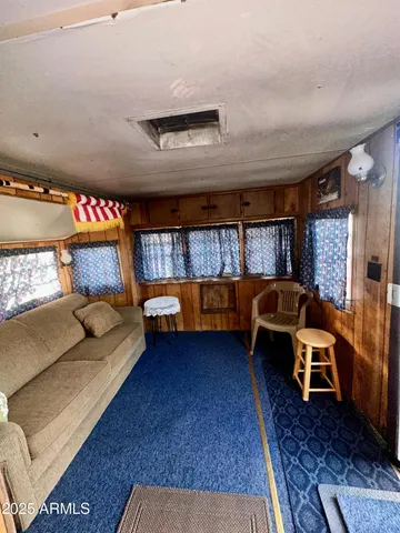 a living room with furniture and a couch