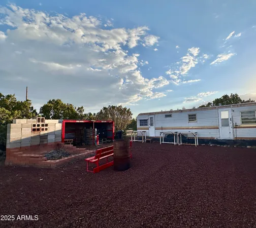 a view of a backyard of a house