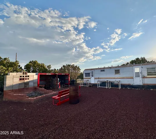 a view of a backyard of a house