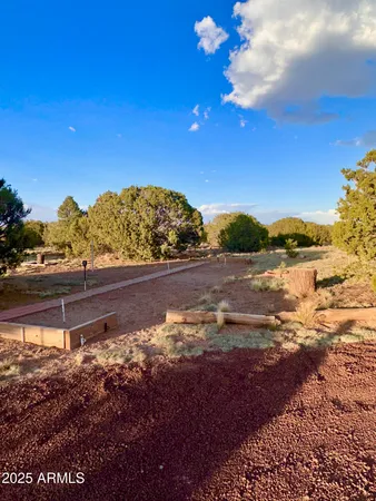 a view of a couches under an umbrella