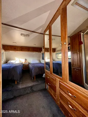 a view of a porch with a car parked