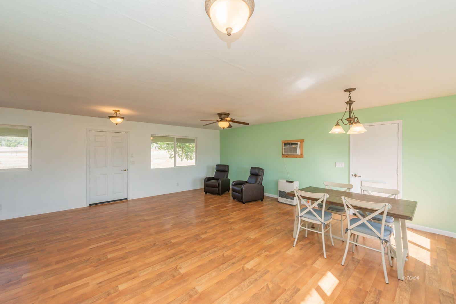 1095 Hyampom Road Hayfork, CA 96041 - Photo 13 of 41 a view of a room with furniture and a chandelier