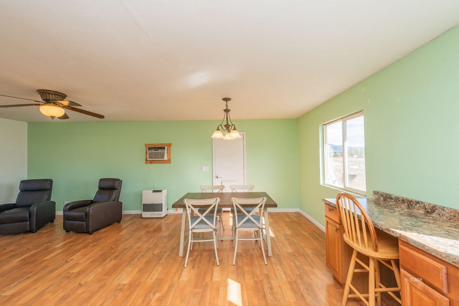 1095 Hyampom Road Hayfork, CA 96041 - Photo 14 of 41 a dining room with furniture and window