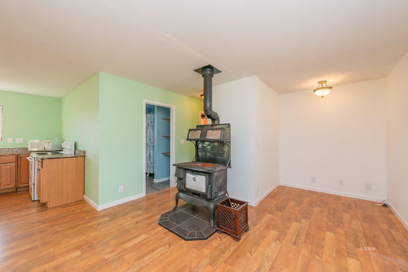 1095 Hyampom Road Hayfork, CA 96041 - Photo 16 of 41 a view of a room with wooden floor