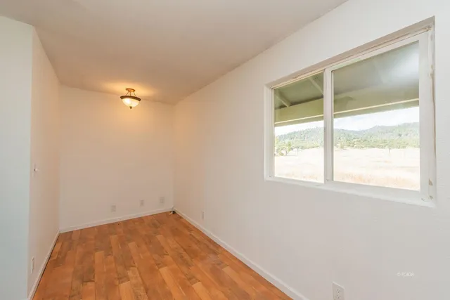 an empty room with a window