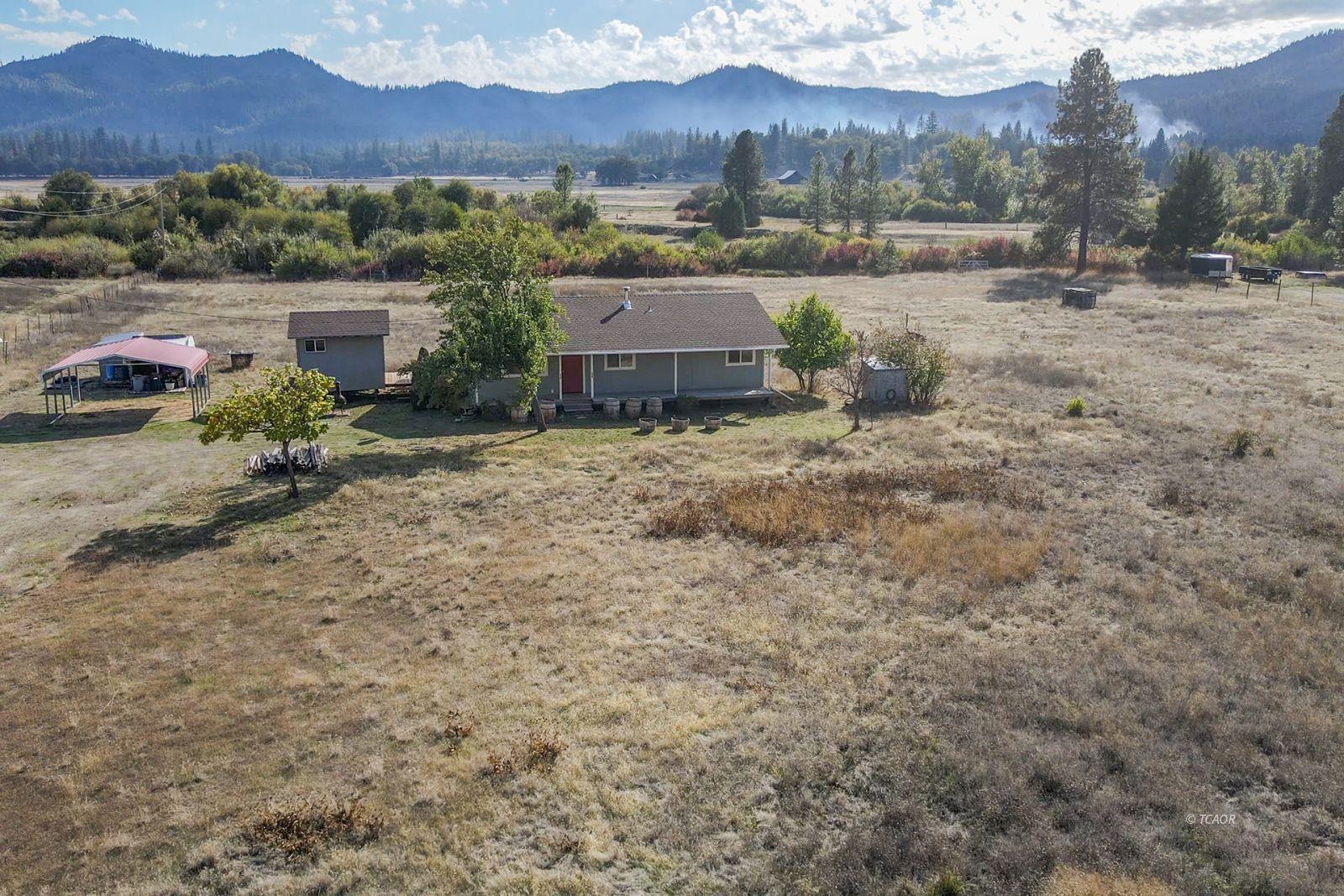 1095 Hyampom Road Hayfork, CA 96041 - Photo 2 of 41 an aerial view of a house with a yard