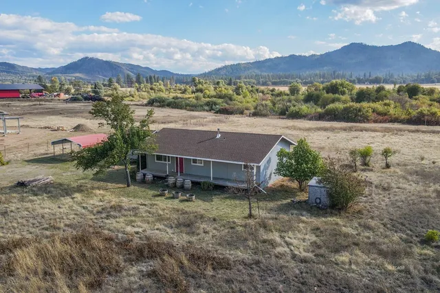 an aerial view of a house with a garden