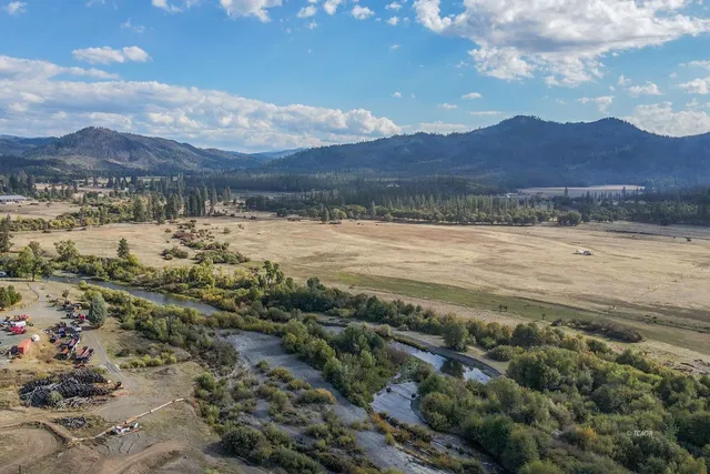 a view of an ocean and a mountain
