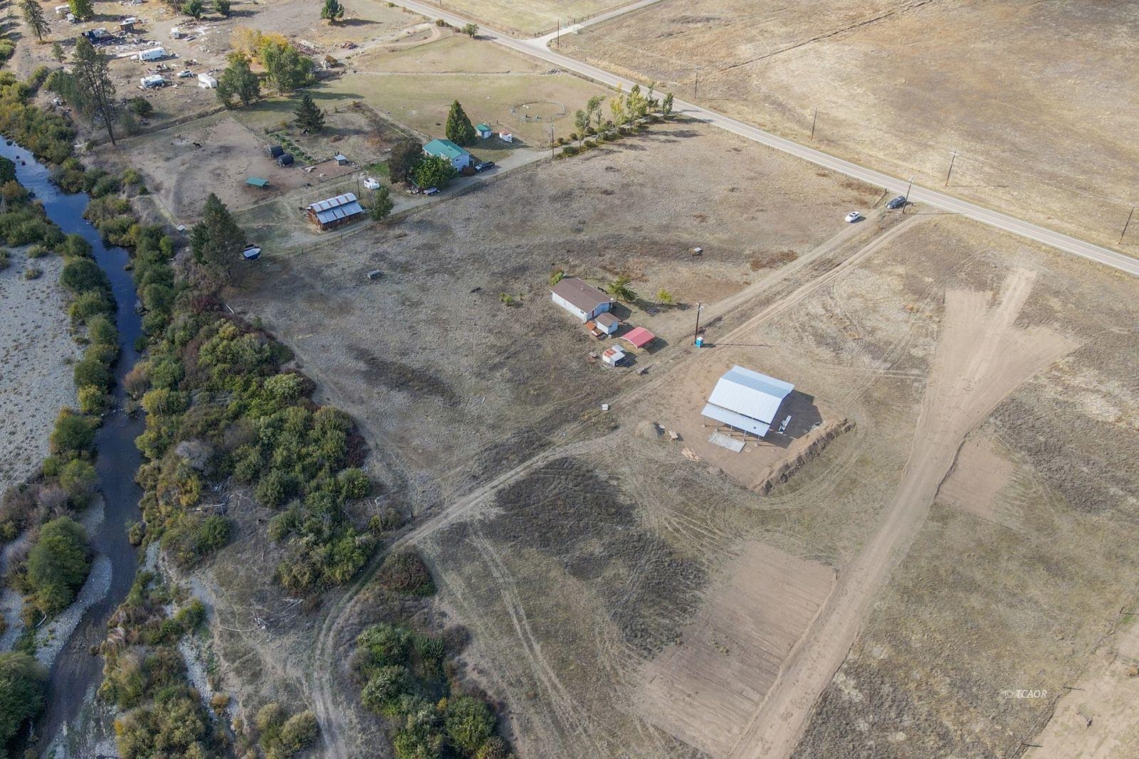 1095 Hyampom Road Hayfork, CA 96041 - Photo 32 of 41 an aerial view of residential houses with outdoor space