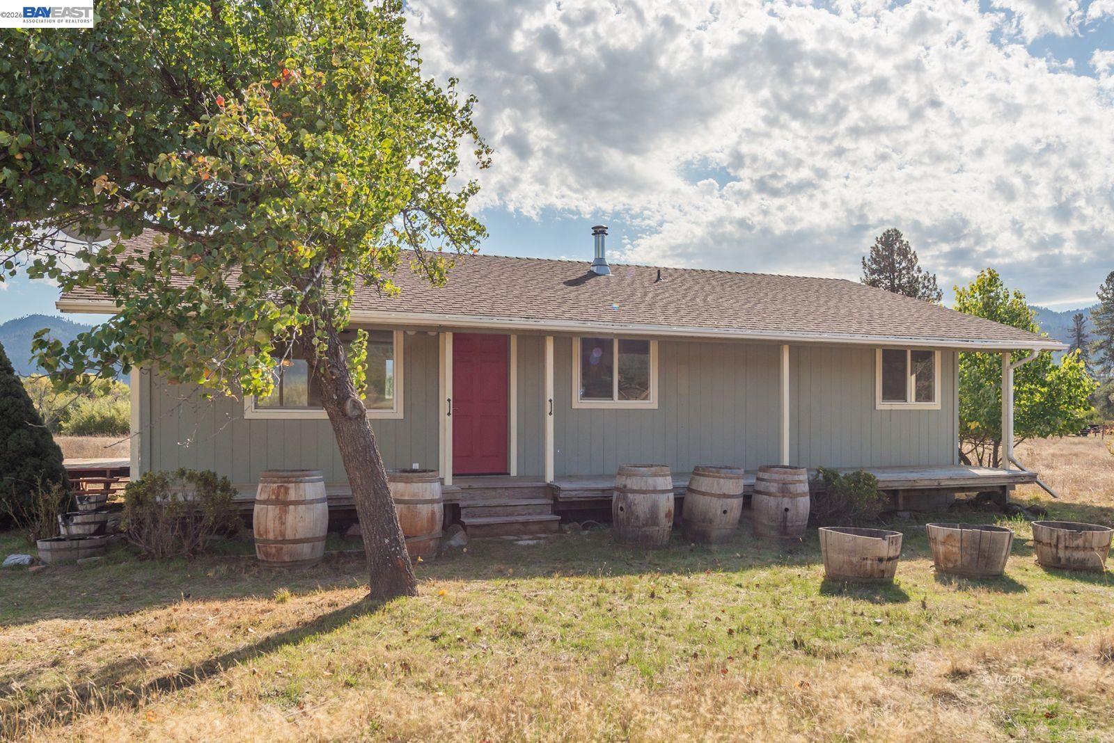1095 Hyampom Road Hayfork, CA 96041 - Photo 34 of 41 a view of a house with swimming pool and sitting area