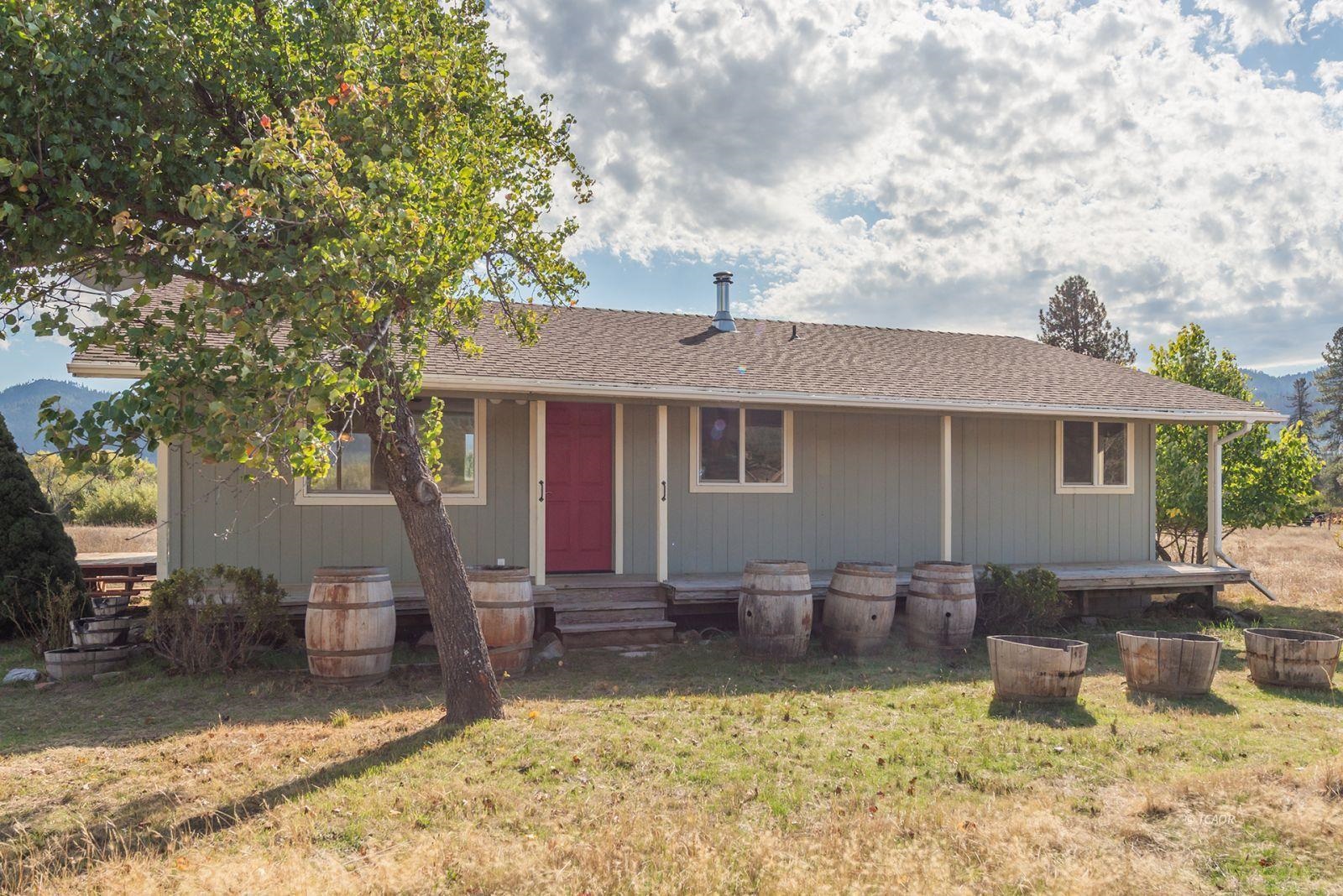 1095 Hyampom Road Hayfork, CA 96041 - Photo 34 of 41 a view of a house with swimming pool and sitting area