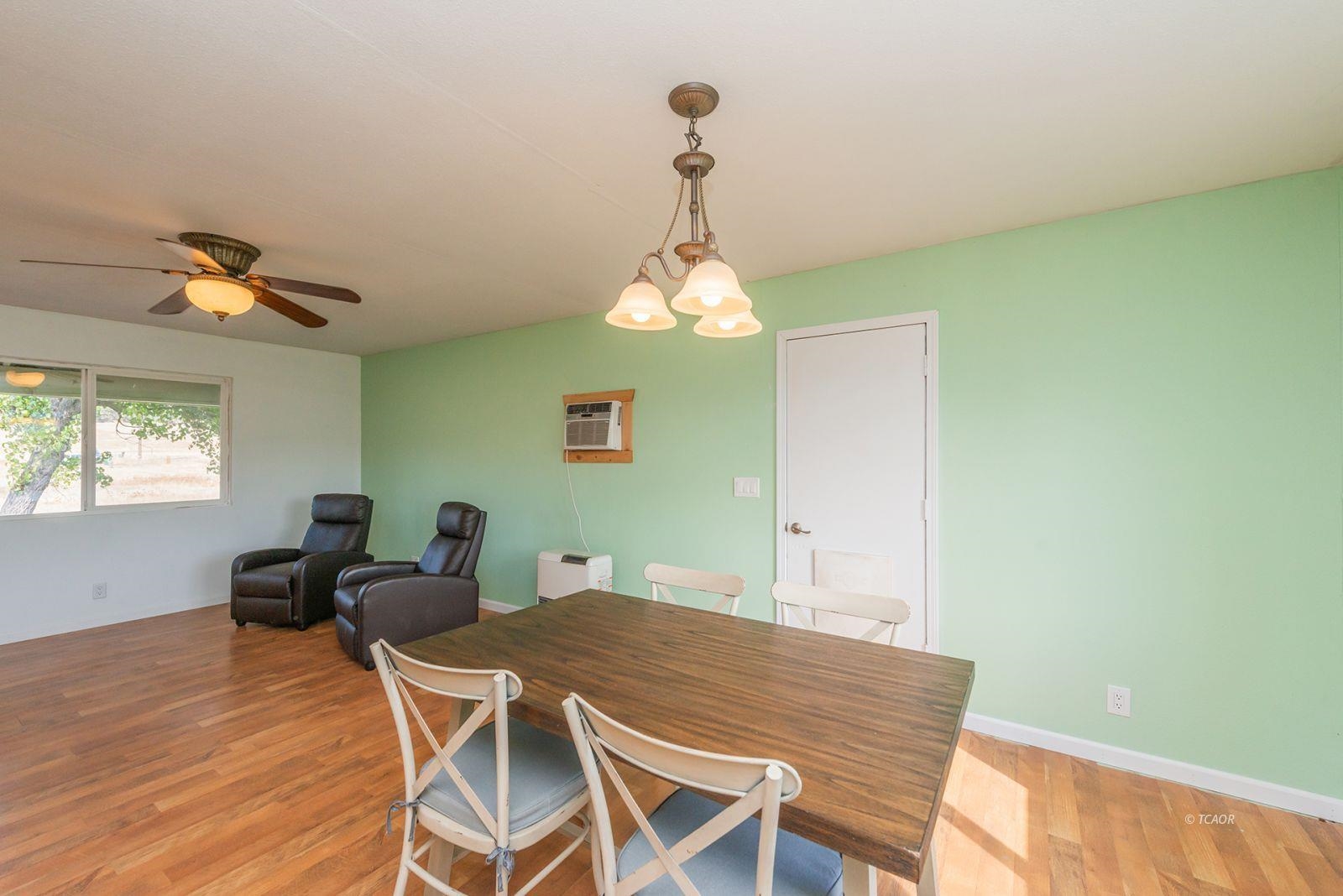 1095 Hyampom Road Hayfork, CA 96041 - Photo 9 of 41 a view of a dining room with furniture and window