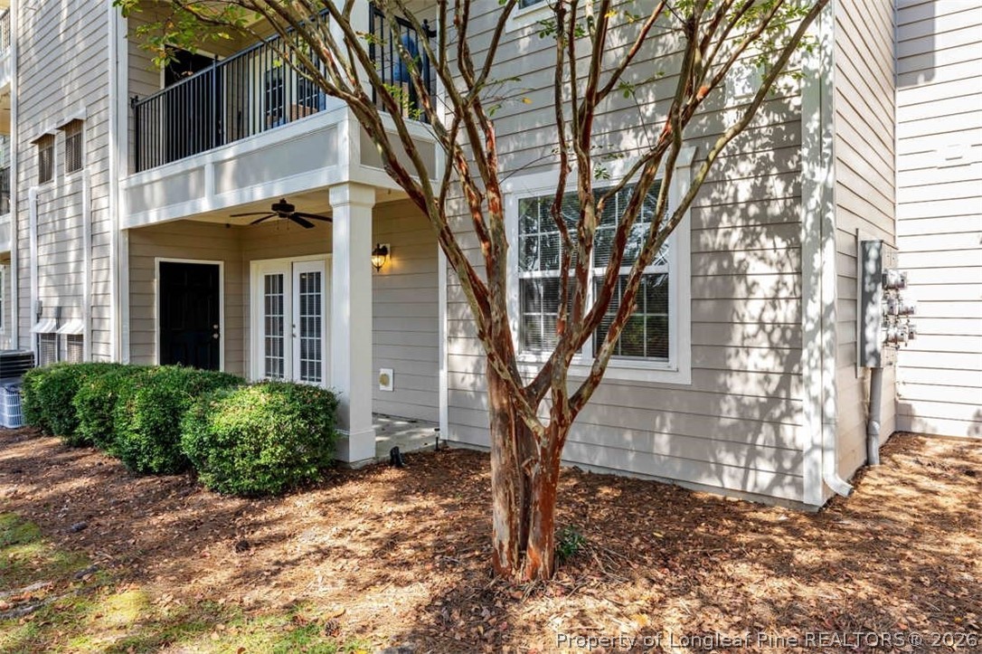 62 Gallery Drive, Unit 102 Spring Lake, NC 28390 - Photo 21 of 23 a front view of a house with a tree