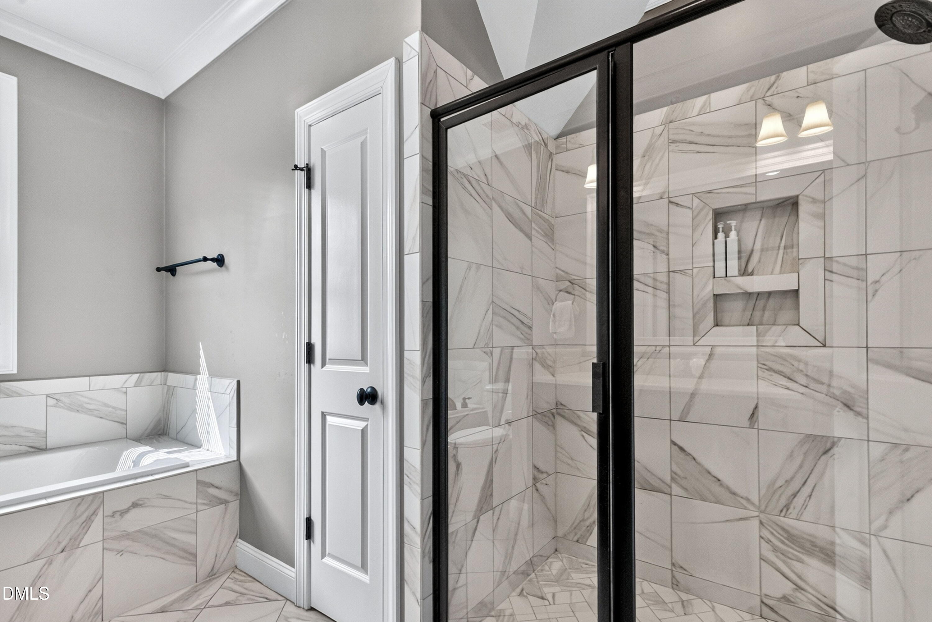 2745 Oberlin Road, Unit 103 Raleigh, NC 27608 - Photo 15 of 23 a bathroom with a bathtub and shower