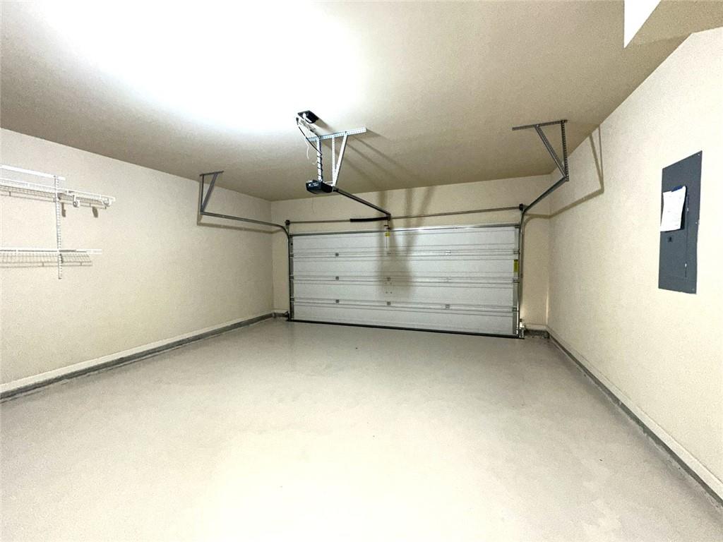 1365 Delo Lane Cumming, GA 30041 - Photo 18 of 43 a view of a room with racks on the wall