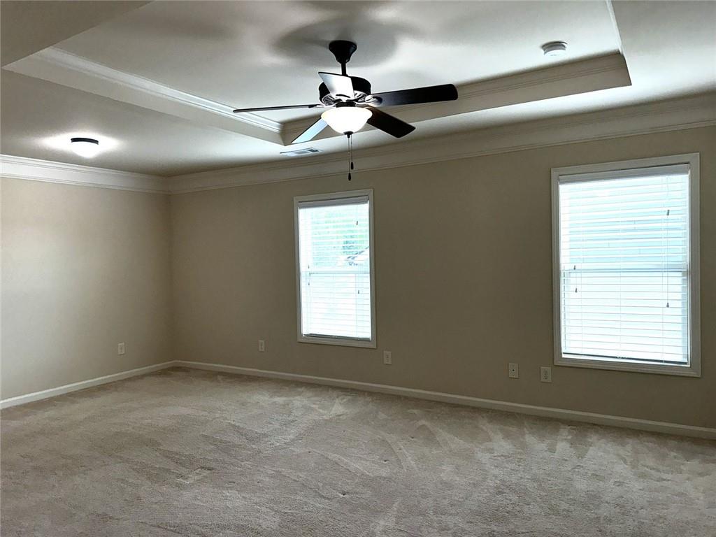 1365 Delo Lane Cumming, GA 30041 - Photo 21 of 43 a view of an empty room with a window