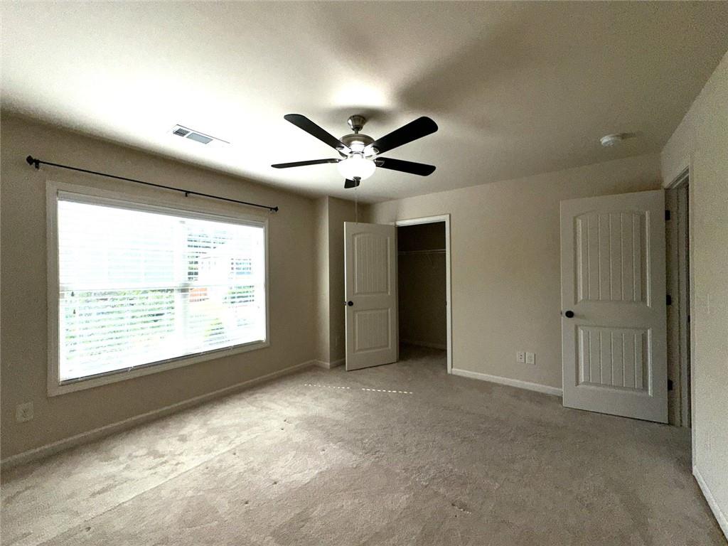 1365 Delo Lane Cumming, GA 30041 - Photo 33 of 43 a view of an empty room with a window