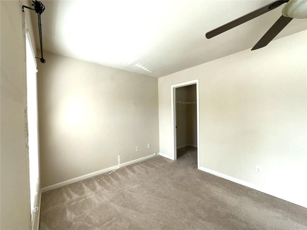 1365 Delo Lane Cumming, GA 30041 - Photo 37 of 43 a view of an empty room