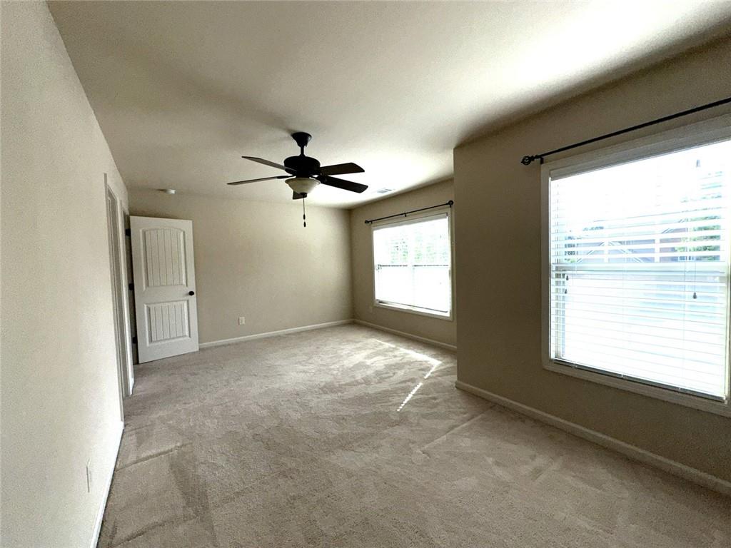 1365 Delo Lane Cumming, GA 30041 - Photo 38 of 43 a view of an empty room with a window