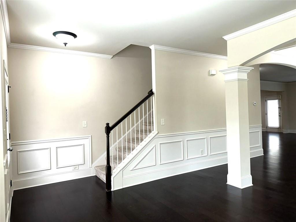 1365 Delo Lane Cumming, GA 30041 - Photo 4 of 43 a view of an entryway with wooden floor