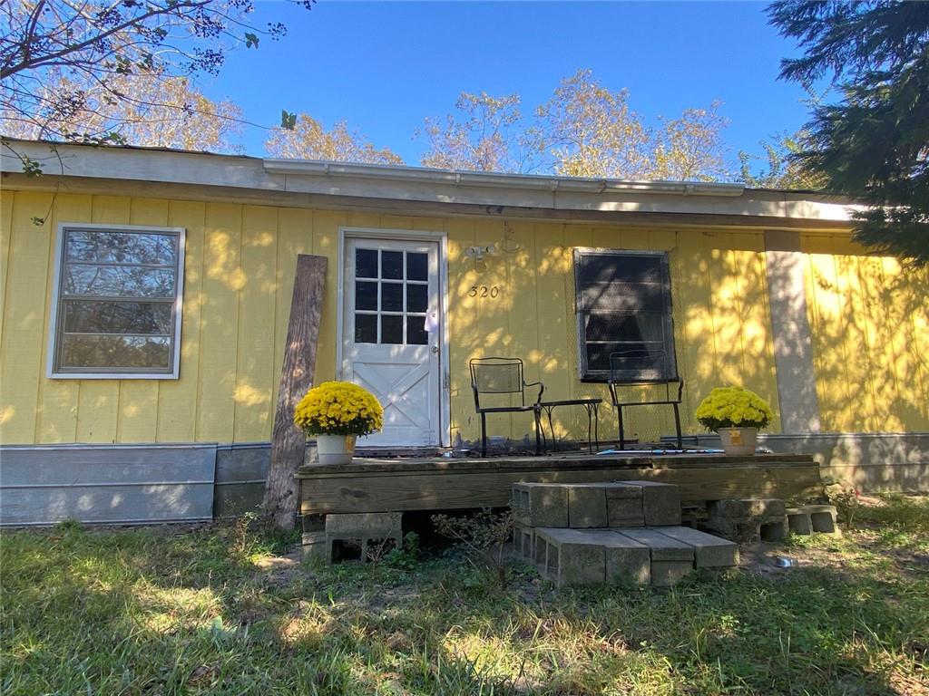320 Old Perry Road Marshallville, GA 31057 - Photo 2 of 70 a view of house with swimming pool