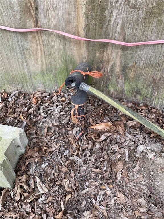 320 Old Perry Road Marshallville, GA 31057 - Photo 24 of 70 a view of a dry yard with wooden fence