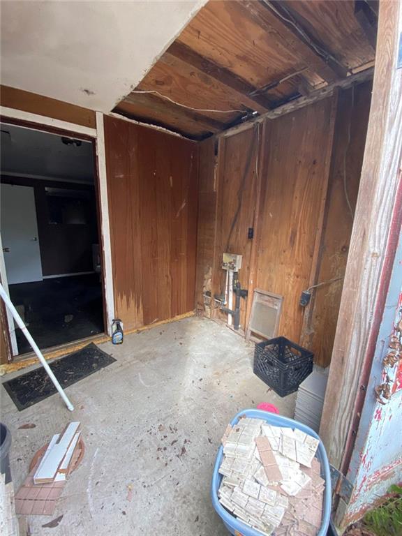 320 Old Perry Road Marshallville, GA 31057 - Photo 26 of 70 a view of an empty room with wooden floor and a window