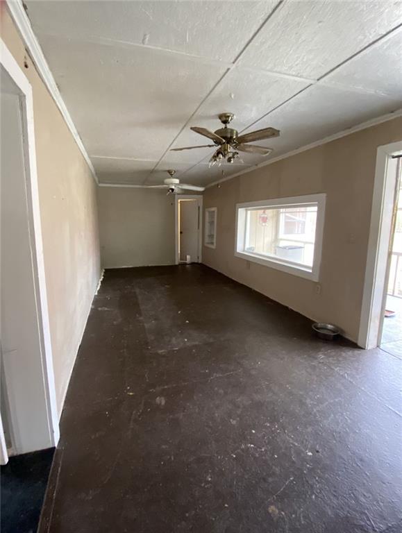 320 Old Perry Road Marshallville, GA 31057 - Photo 62 of 70 a view of a livingroom with a ceiling fan and window