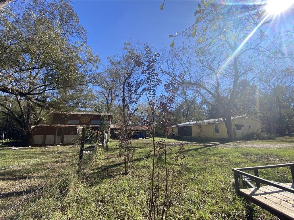 320 Old Perry Road Marshallville, GA 31057 - Photo 8 of 70 a view of a backyard with sitting area