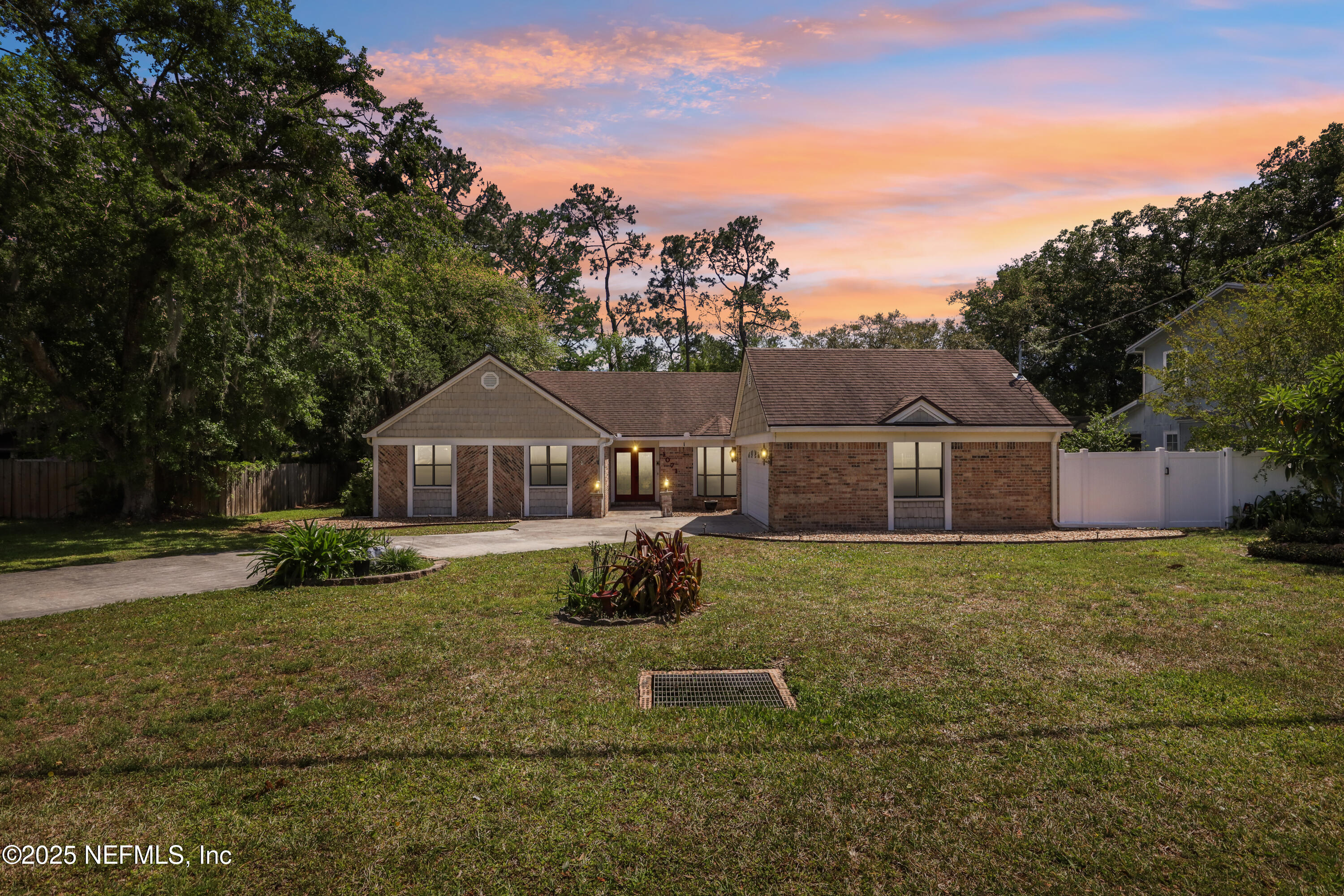 1071 Orangewood Road St. Johns, FL 32259 - Photo 1 of 56 a house view with a garden space