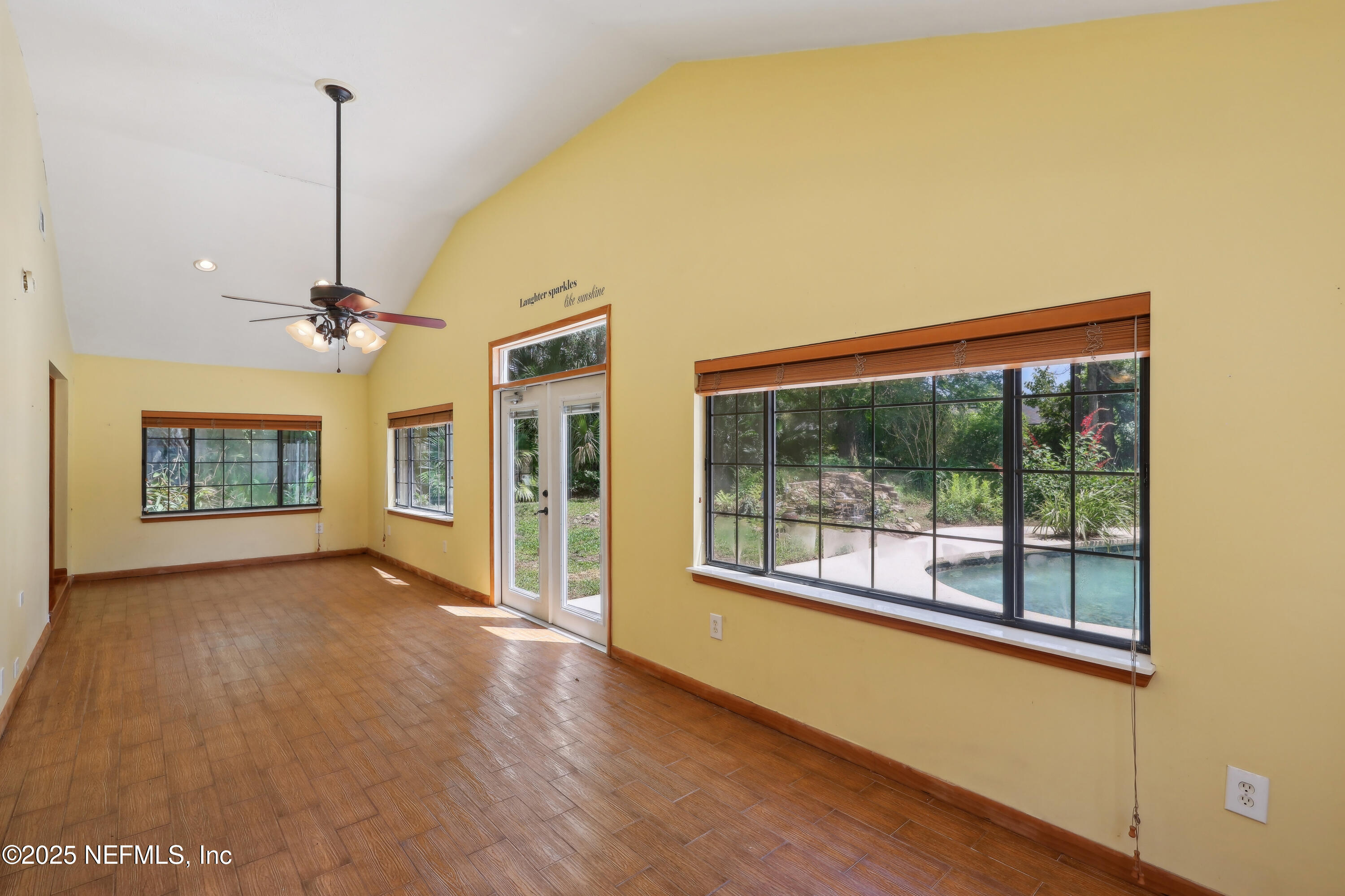 1071 Orangewood Road St. Johns, FL 32259 - Photo 24 of 56 a view of a room with window ceiling fan and hardwood floor