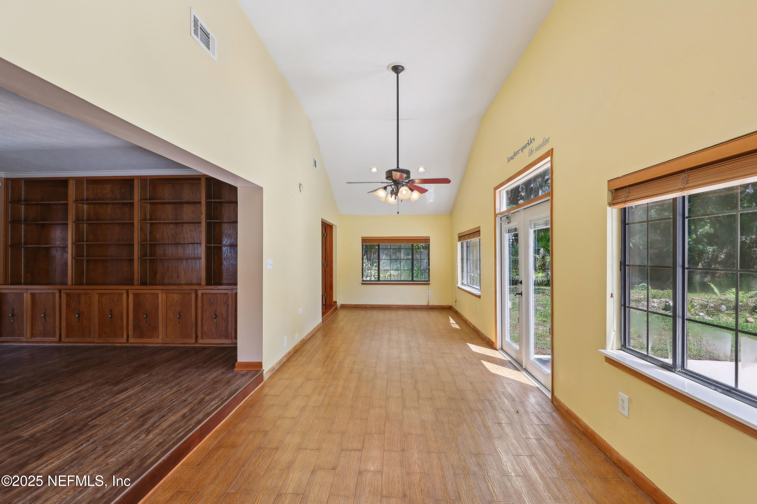 1071 Orangewood Road St. Johns, FL 32259 - Photo 25 of 56 a view of a house with wooden floor and a ceiling fan