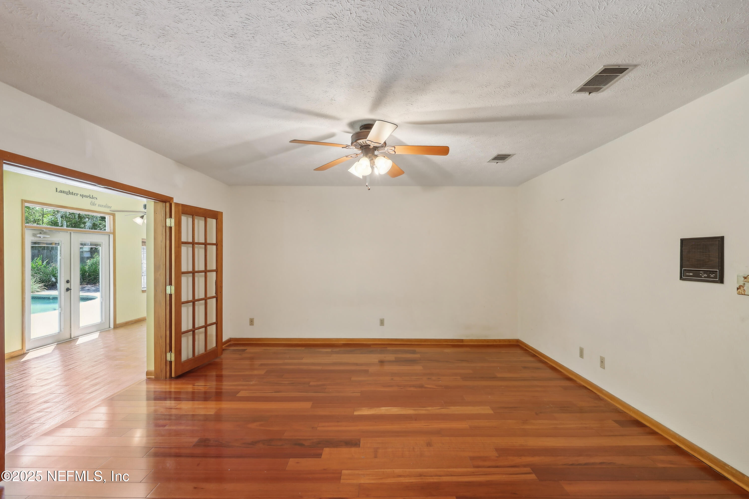 1071 Orangewood Road St. Johns, FL 32259 - Photo 32 of 56 wooden floor in an empty room with a window