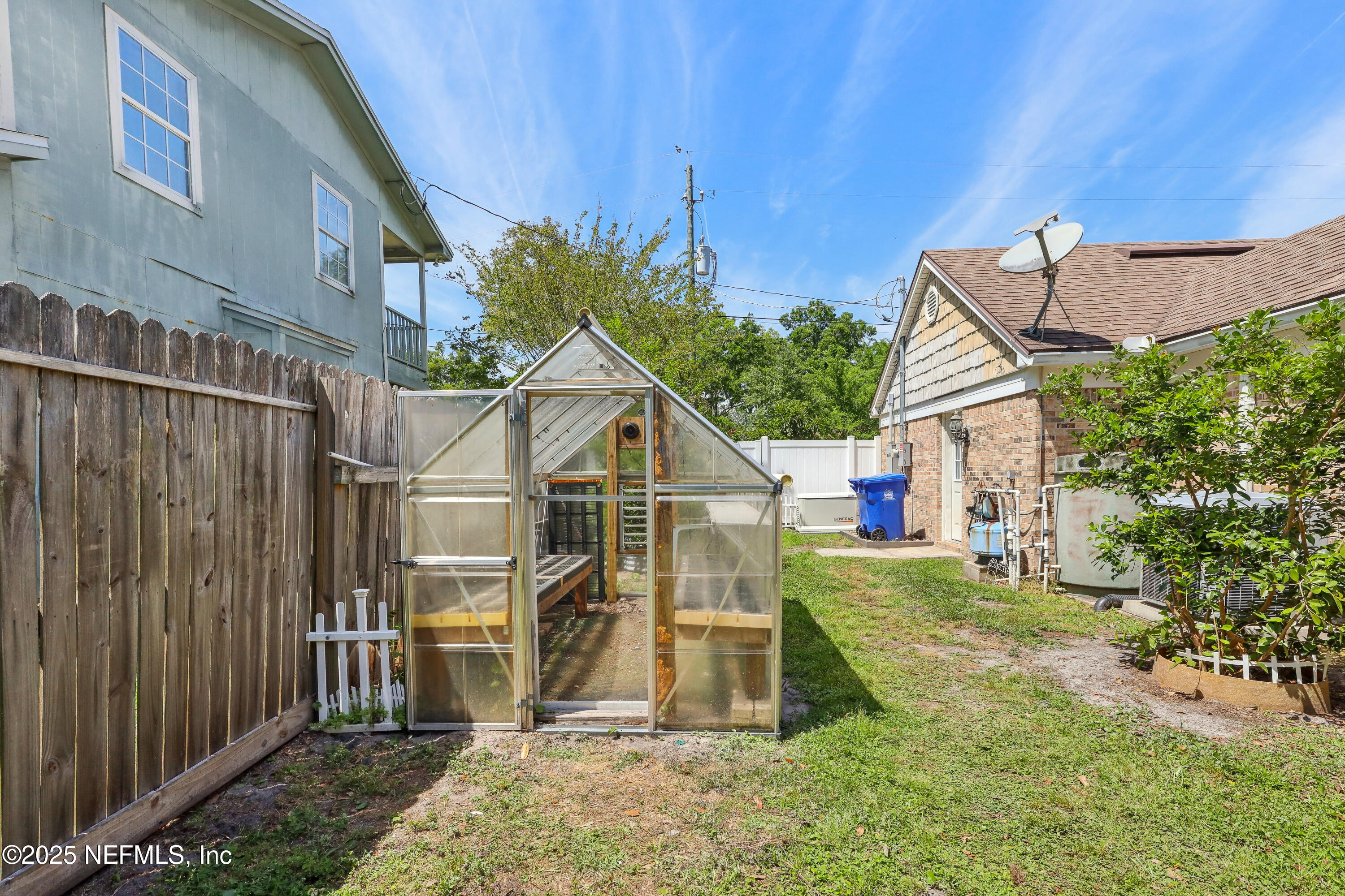 1071 Orangewood Road St. Johns, FL 32259 - Photo 46 of 56 a view of a back yard of the house