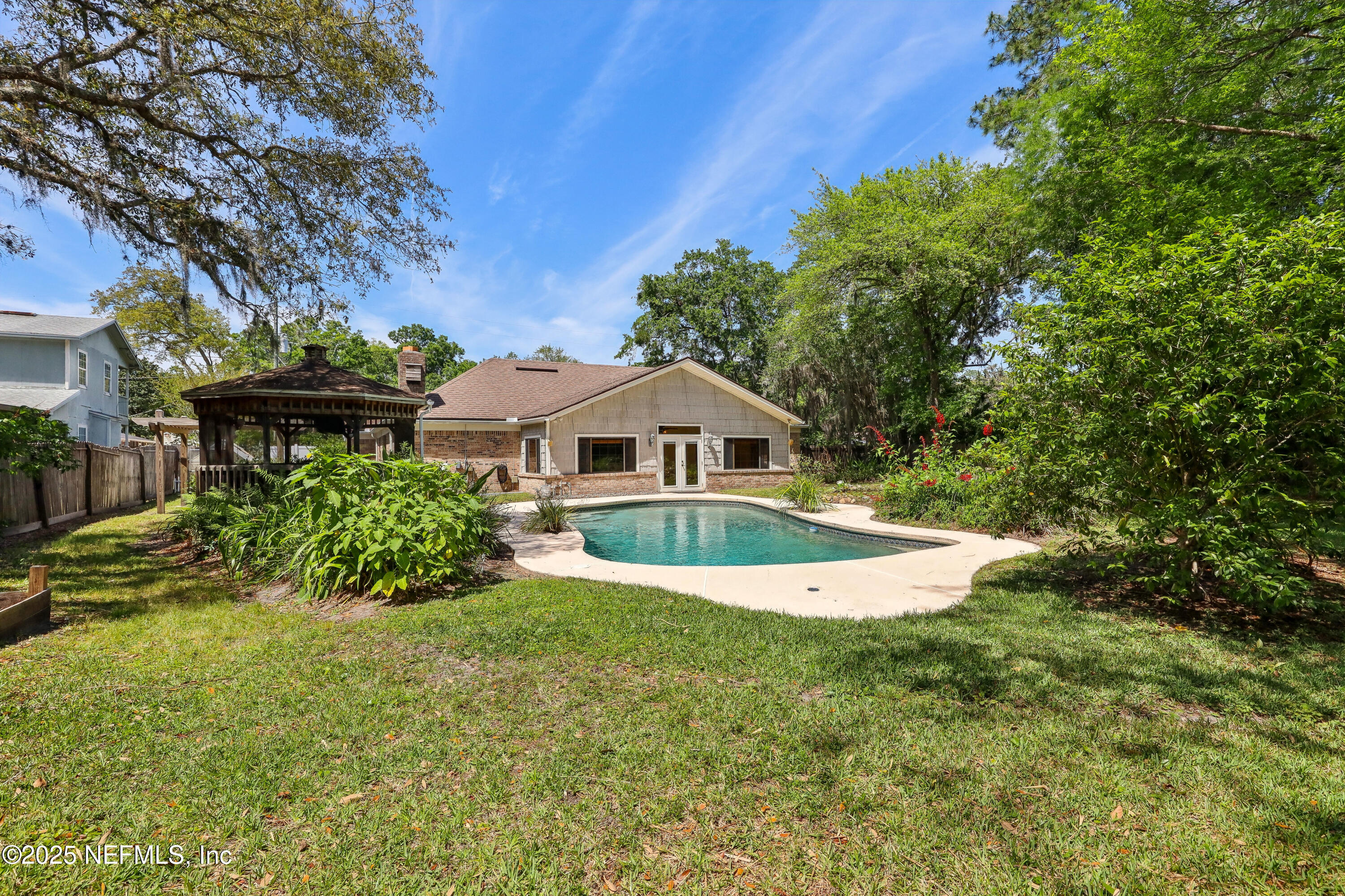 1071 Orangewood Road St. Johns, FL 32259 - Photo 49 of 56 a view of a house with swimming pool