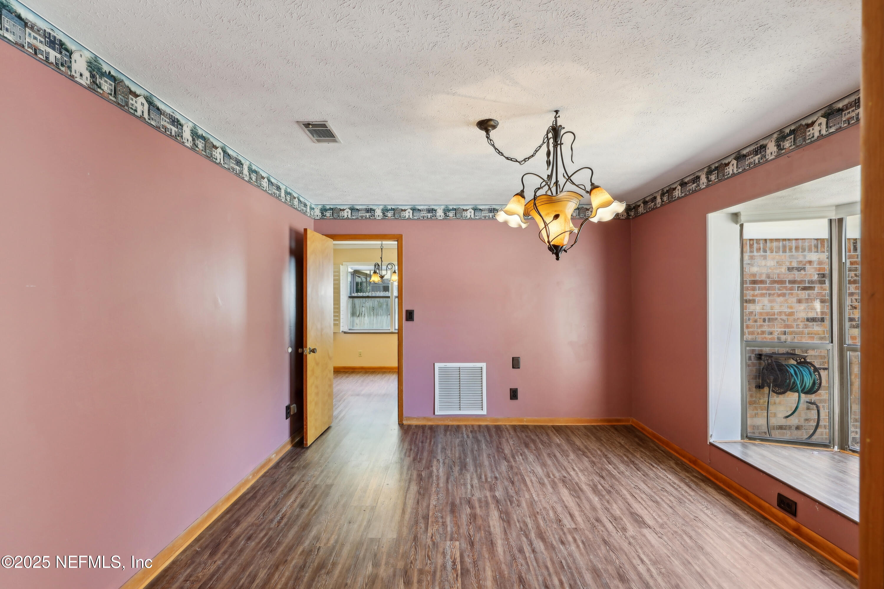1071 Orangewood Road St. Johns, FL 32259 - Photo 9 of 56 a view of entryway with wooden floor