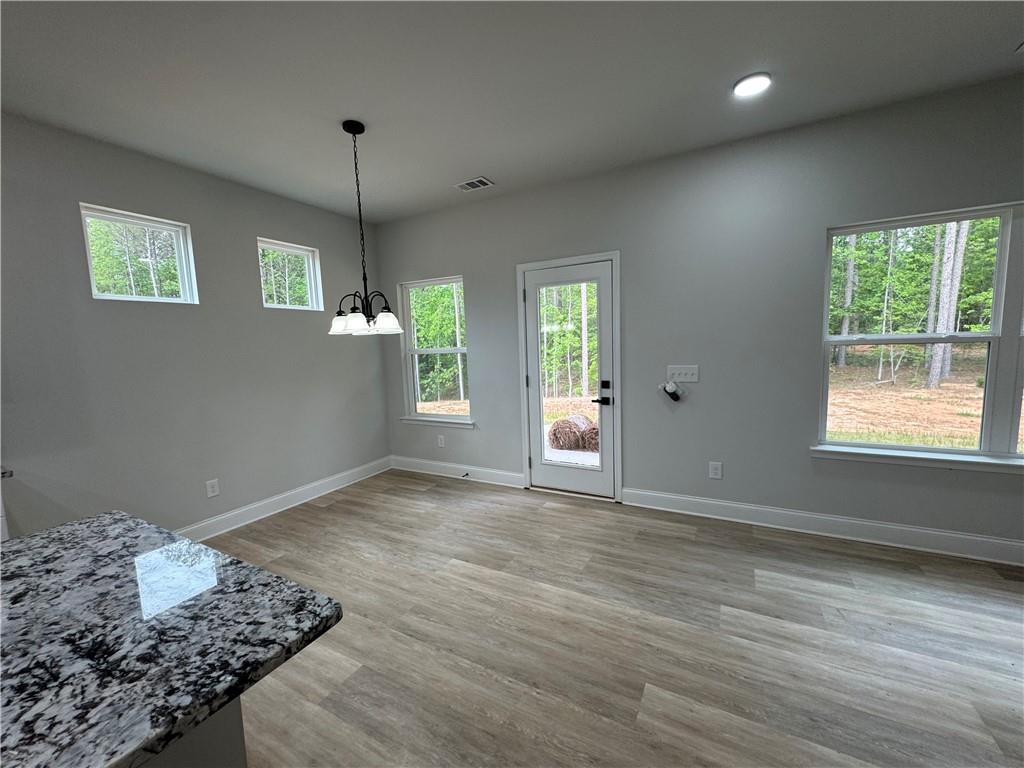 2057 North Hicks Road Toccoa, GA 30577 - Photo 13 of 22 a view of an empty room with a window