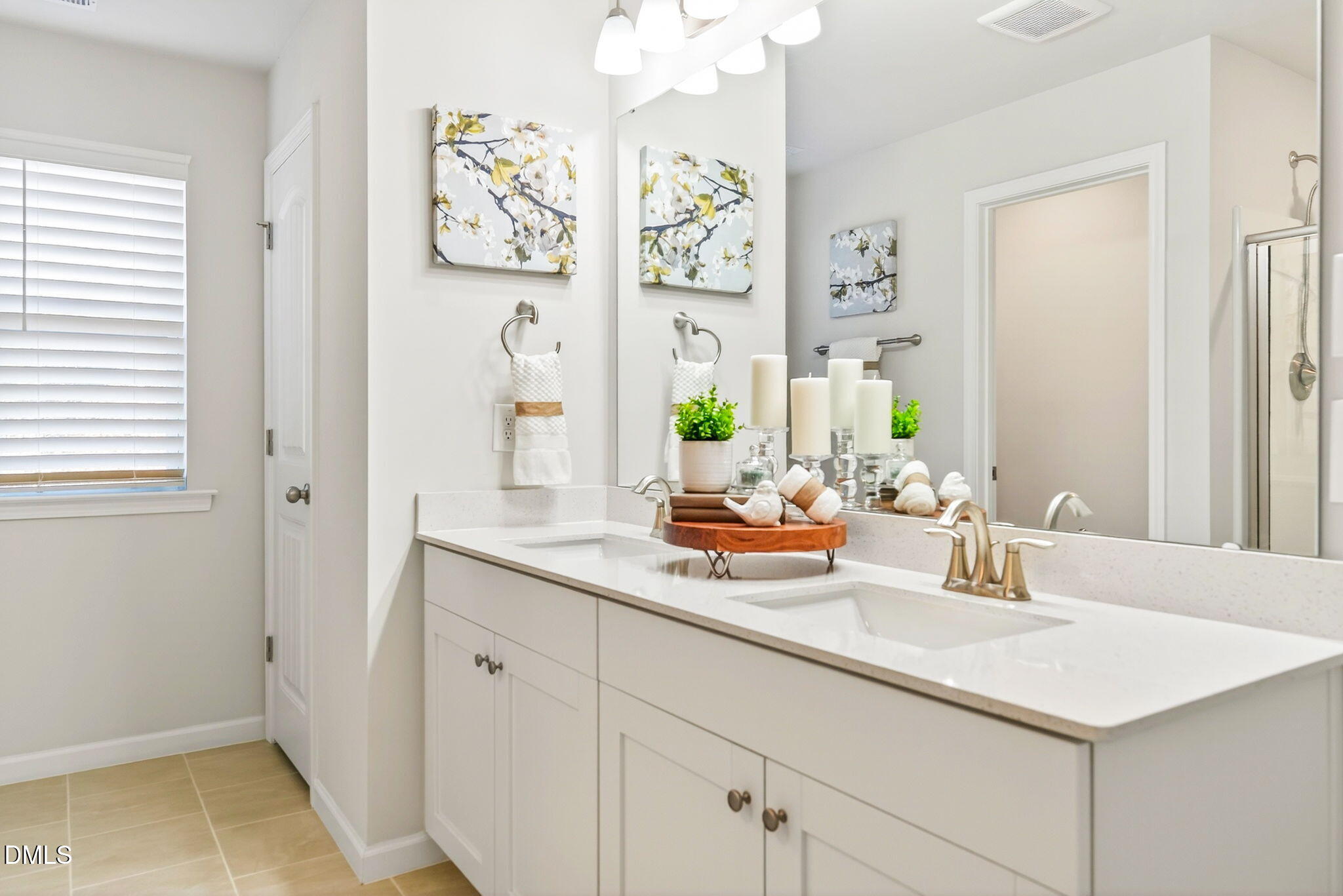 211 Kineton Woods Way Garner, NC 27529 - Photo 12 of 18 a bathroom with a sink and a mirror
