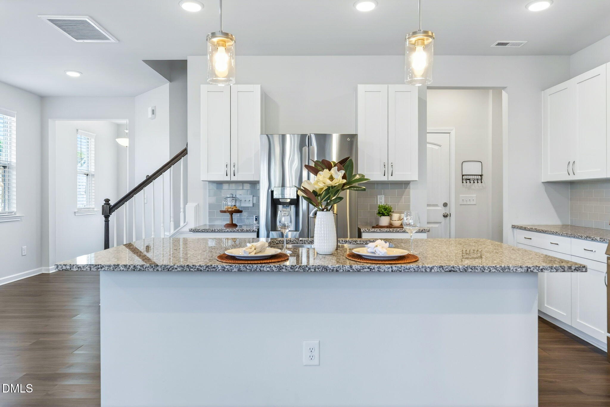 211 Kineton Woods Way Garner, NC 27529 - Photo 5 of 18 a kitchen with sink and cabinets
