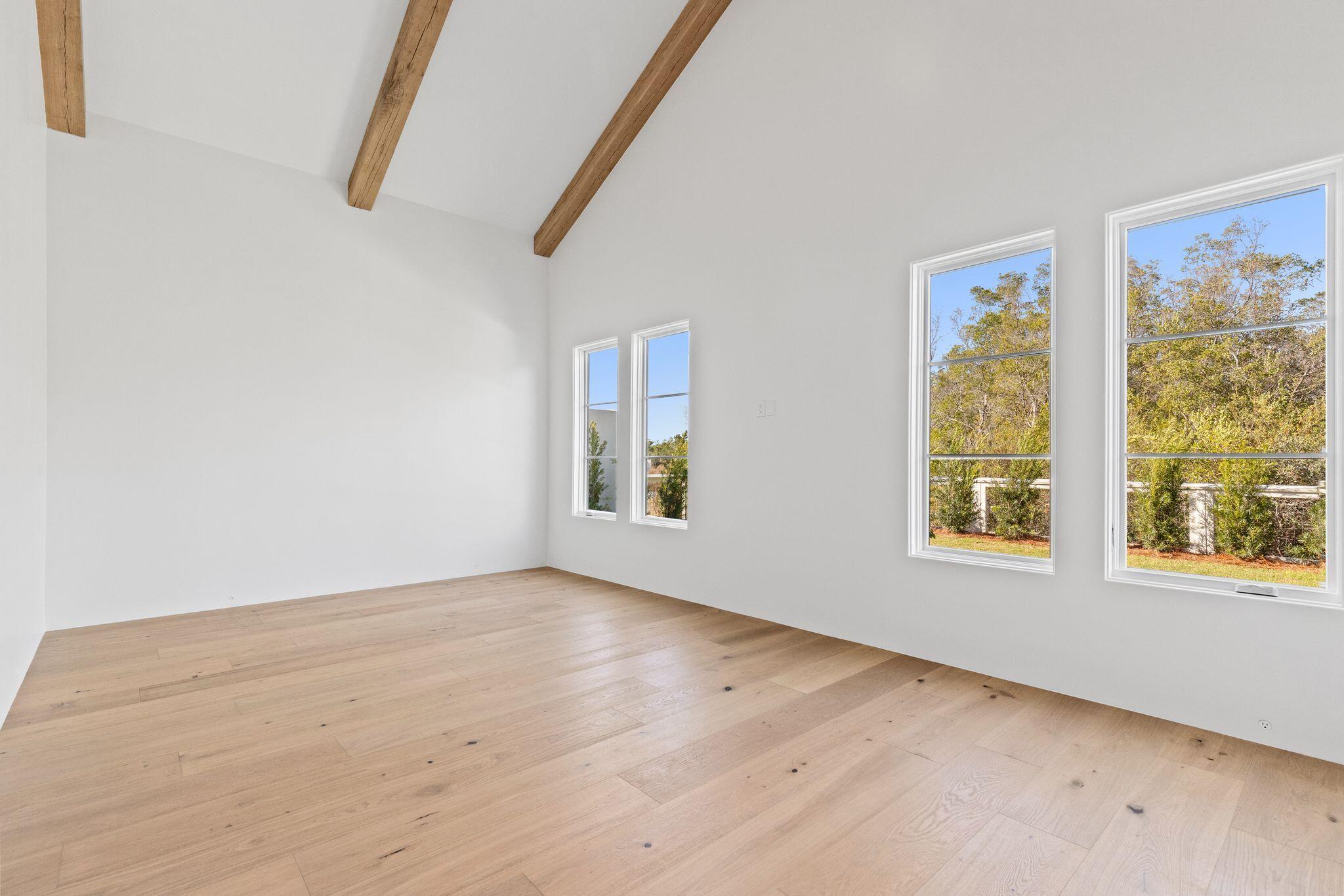 89 Quail Hollow Inlet Beach, FL 32461 - Photo 26 of 75 a view of an empty room with wooden floor and a window
