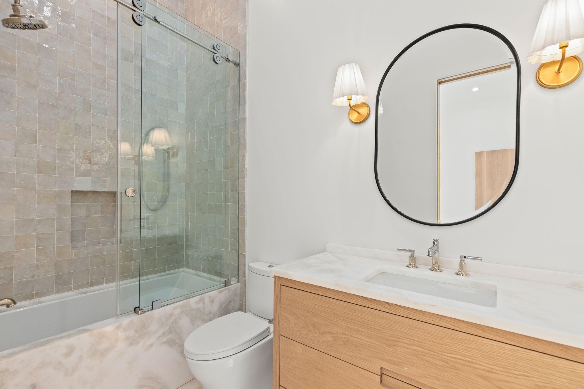 89 Quail Hollow Inlet Beach, FL 32461 - Photo 35 of 75 a bathroom with a sink a toilet and a mirror