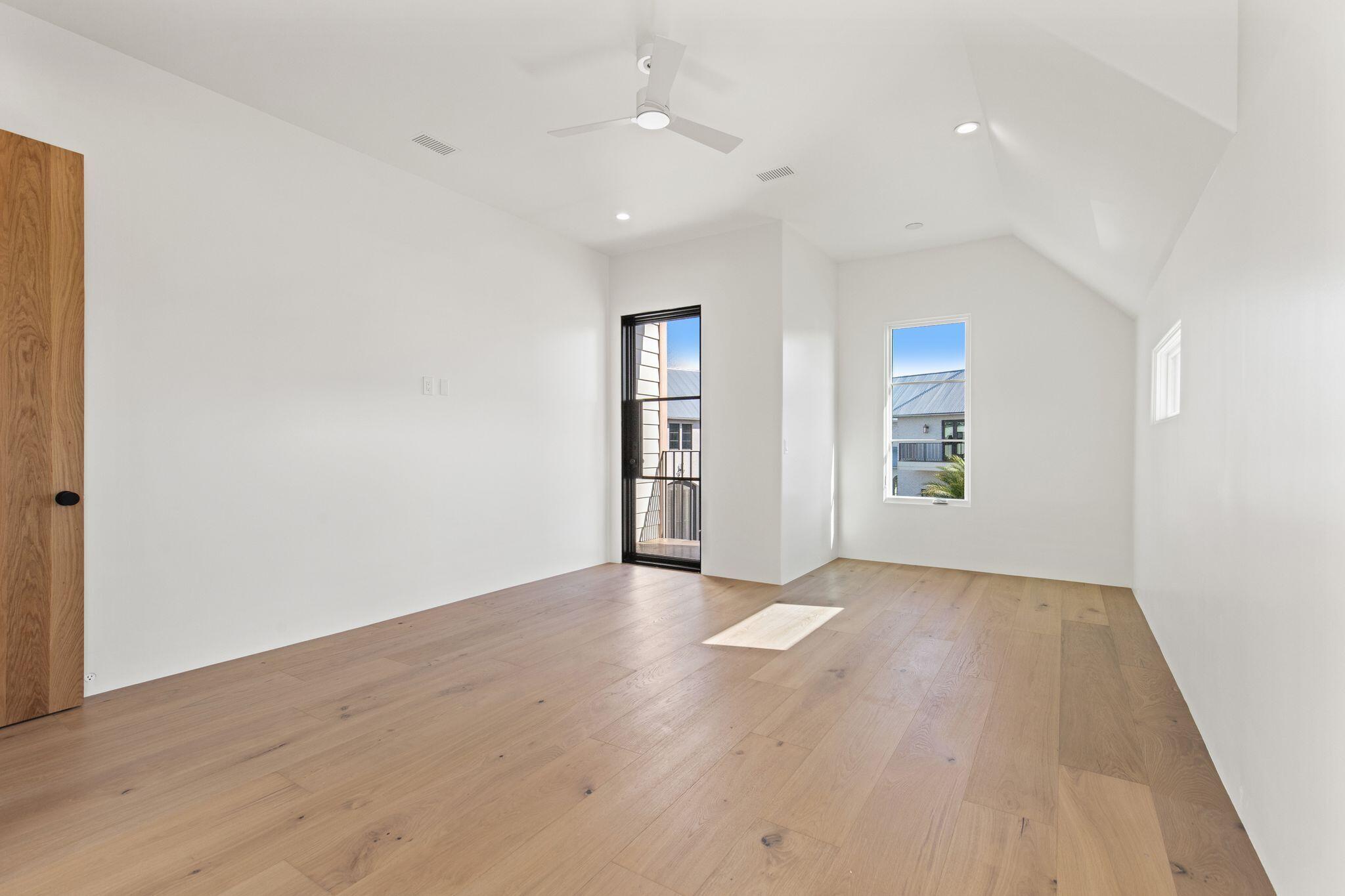89 Quail Hollow Inlet Beach, FL 32461 - Photo 48 of 75 a view of an empty room with window and wooden floor