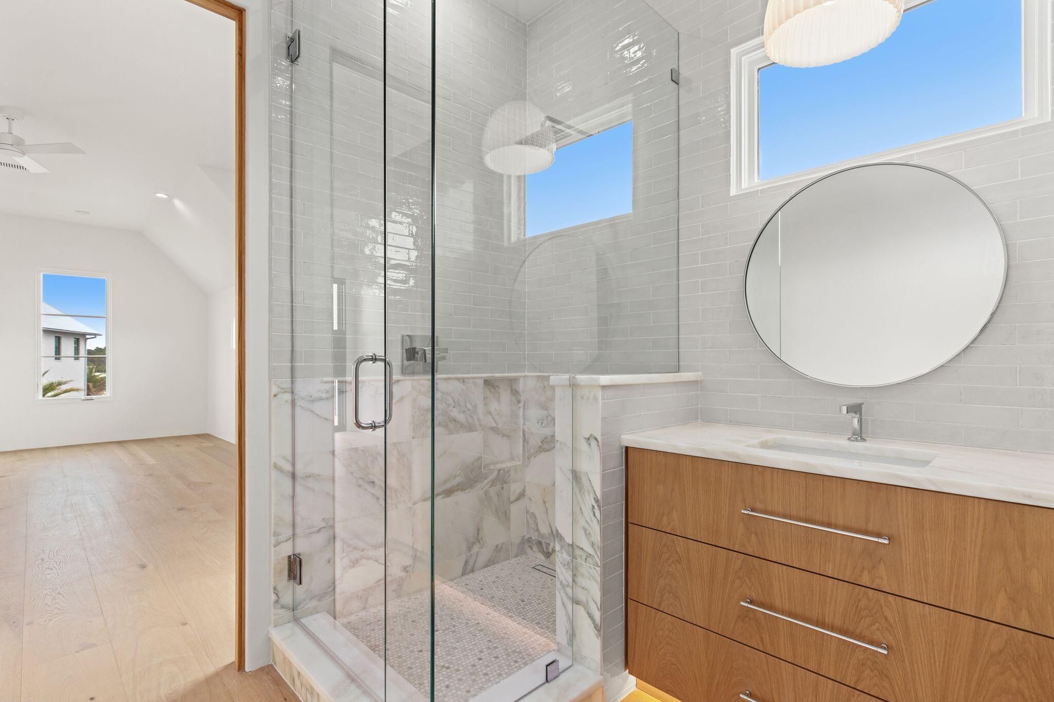 89 Quail Hollow Inlet Beach, FL 32461 - Photo 58 of 75 a bathroom with a double vanity sink mirror and shower